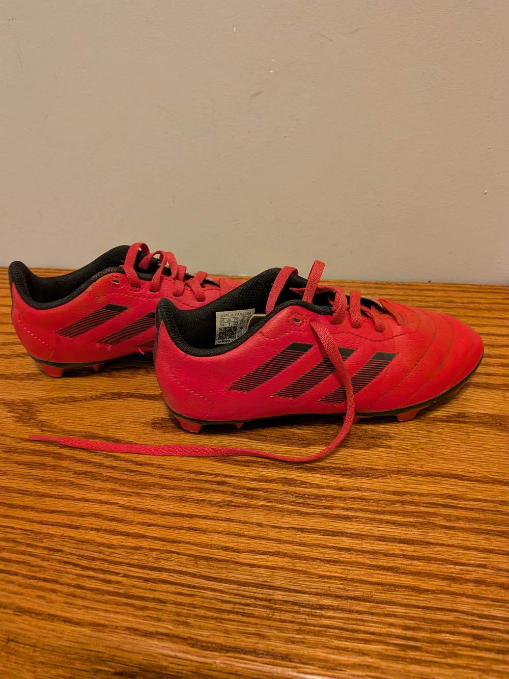 adidas Kids Red Soccer Cleats with Black Stripes